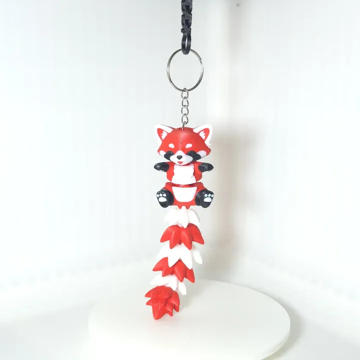 Llavero articulado de panda rojo impreso en 3D